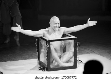 BARCELONA - JANUARY 1: Unidentified Contortionist Man Performs During The New Spectacle Of Raluy Circus, On January 1, 2014 In Barcelona, Spain.