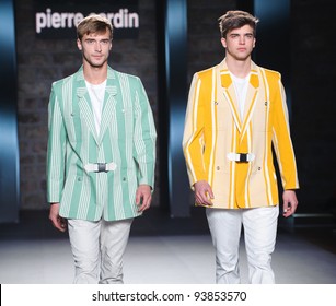 BARCELONA – JANUARY 28: French Model Clement Chabernaud (green Jacket) On The Pierre Cardin Catwalk During The 080 Barcelona Fashion Runway On January 28, 2012 In Barcelona, Spain.