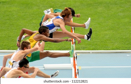 BARCELONA - JULY 10: Competitors of 110 meters hurdles during the 20th World Junior Athletics Championships at the Olympic Stadium on July 10, 2012 in Barcelona, Spain
