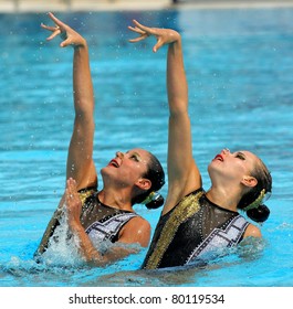 BARCELONA -JUNE 18: Mexican synchro swimmers Mariana Cifuentes and Isabel Delgado in a Duet exercise during the Espana Sincro meeting in Barcelona Picornell Swimpool, June 18, 2011 in Barcelona, Spain