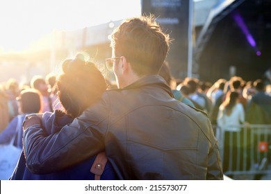 BARCELONA - MAY 30: A Couple Of The Audience Watch A Concert Together At Heineken Primavera Sound 2014 Festival (PS14) On May 30, 2014 In Barcelona, Spain.