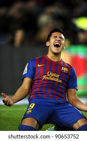 BARCELONA - NOV 29: Alexis Sanchez of FC Barcelona celebrates a goal during the Spanish league match against Rayo Vallecano at the Nou Camp Stadium on November 29, 2011 in Barcelona, Spain