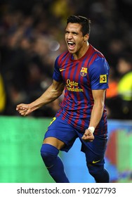 BARCELONA - NOV, 29: Alexis Sanchez of FC Barcelona celebrates goal during the spanish league match against Rayo Vallecano at the Nou Camp Stadium on November 29, 2011 in Barcelona, Spain
