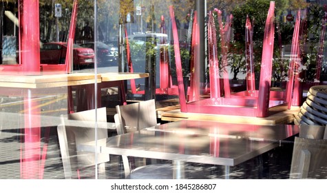 Barcelona, ​​Spain. November 1, 2020. Catalonia Closes Bars And Restaurants To Combat COVID. Interior Of A Closed Restaurant In Barcelona. Tables And Chairs Are Stacked Inside.