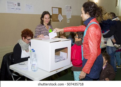 BARCELONA - NOVEMBER 9: Unidentified woman votes in symbolic referendum on Catalonia independence, in defiance of the central government in Madrid, on November 9, 2014, in El Masnou, Barcelona, Spain.