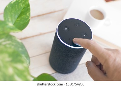 BARCELONA, OCTOBER 30: User's hand pushing buttons of an Alexa Echo Plus on October 30, 2019