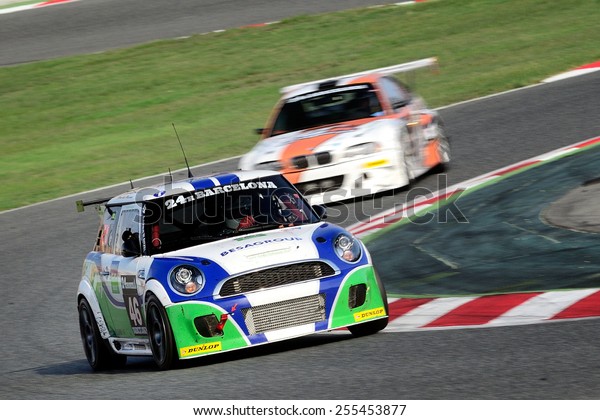 BARCELONA, SAPIN - SEP 7: Team formed by Franjo\
Kovac , Henry Littig and Kai Jordan races in a BMW Mini R56 in the\
24 Hours of Barcelona, at Catalunya Circuit, on Sep 7, 2014 in\
Barcelona, Spain.
