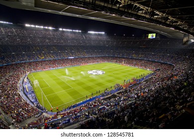 BARCELONA - SEPTEMBER 13: Crowd of people in Camp Nou stadium before the Champions League match between FC Barcelona and AC Milan, final score 2 - 2, on September 13, 2011, in Barcelona, Spain.