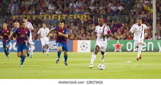 BARCELONA - SEPTEMBER 13: Some Players In Action At The Champions League Match Between FC Barcelona And Milan, Final Score 2 - 2, On September 13, 2011, In Camp Nou Stadium, Barcelona, Spain.