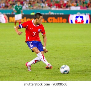 BARCELONA - SEPTEMBER 4: Alexis Sanchez (7) in action during the friendly match between Mexico and Chile, final score 1 - 0, on September 4, 2011, in Cornella stadium, Barcelona, Spain.