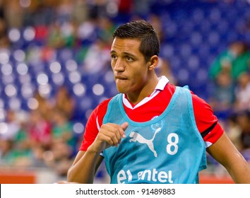 BARCELONA - SEPTEMBER 4: Alexis Sanchez of Chile warms-up during the friendly match between Mexico and Chile, final score 1 - 0, on September 4, 2011, in Cornella stadium, Barcelona, Spain.