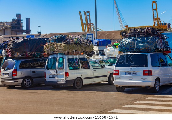 Barcelona / Spain\
04 04 2019: Overloaded cars on weight control. Violation of cargo\
carriage rate, baggage\
allowance.