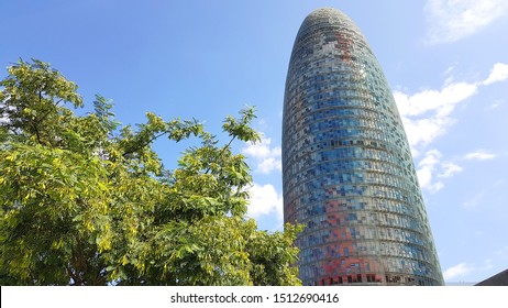 Barcelona, Spain - 09 September, 2019: View Of The Torre Glòries In The Poblenou Neighbourhood. It Is One A High-tech Landmark In The City.