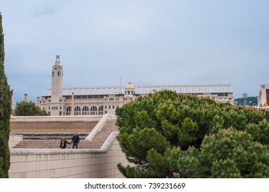 Barcelona Spain - April 12. 2012: Couple Walking Away From The Olympic Stadium In Barcelona