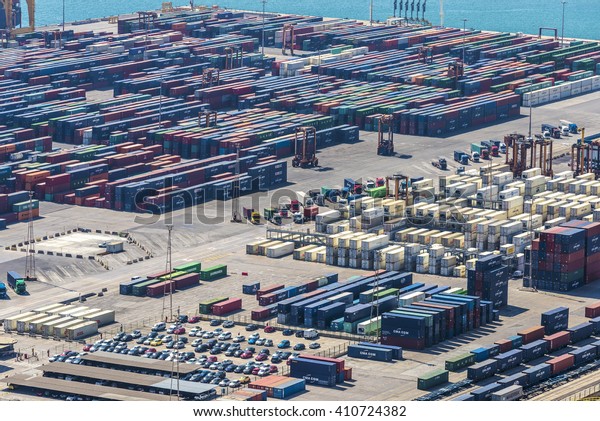 Barcelona, Spain - April 15, 2016: View\
of the loading dock of goods at the port of\
Barcelona