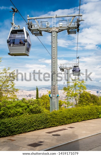 BARCELONA, SPAIN - April, 2019: Teleferic of\
Montjuic in Barcelona. The cable car links the city of Barcelona to\
the top of the mountain of\
Montjuic.