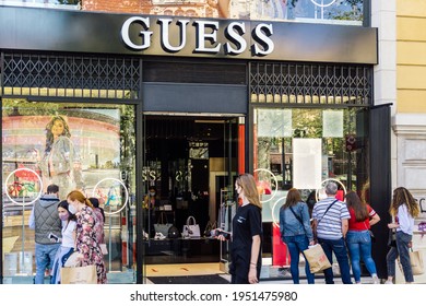 Barcelona, Spain - April 3, 2021. Logo And Facade Of Guess Brand Of Clothing Lines Worldwide