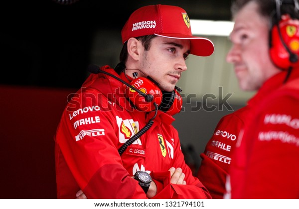 Barcelona, Spain. February 18/21, 2019.\
F1 test for season 2019. Portrait of Charles Leclerc, Monaco, new\
driver of Scuderia Ferrari, talking with\
technicians.