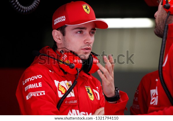 Barcelona, Spain. February 18/21, 2019.\
F1 test for season 2019. Portrait of Charles Leclerc, Monaco, new\
driver of Scuderia Ferrari, talking with\
technicians.