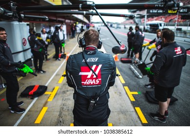 Barcelona, Spain - February 26-27, 2018: Haas F1 Team Mechanics At Formula One Testing At Catalunya Circuit In Barcelona, Spain.