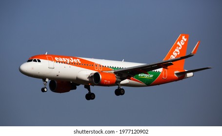 BARCELONA, SPAIN - JANUARY 24, 2020: View of British Airline EasyJet PLC OE-IVT Airbus A320-214 painted in Europcar special colours during final approaching to runway at El Prat Airport