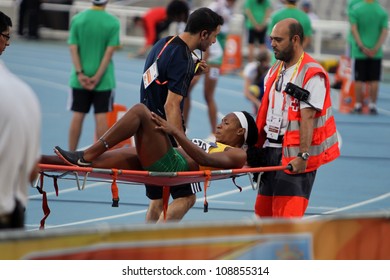 BARCELONA, SPAIN - JULY 12: Red Cross Providing First Aid To Injured Athlete On The 2012 IAAF World Junior Athletics Championships On July 12, 2012 In Barcelona, Spain.