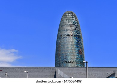 Barcelona, Spain. July 19, 2019.Torre Glòries At The Back Of The Design Museum Of Barcelona