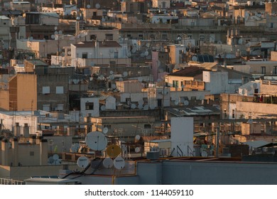 Barcelona, Spain, July 2018: Barcelona City Aerial View. Roofs Covered With Satelite Anthenas