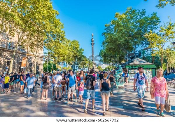 BARCELONA, SPAIN -\
JULY 24, 2016: Street view of La Rambla in Barcelona, Spain.\
Barcelona is the capital city of the autonomous community of\
Catalonia in the Kingdom of\
Spain.