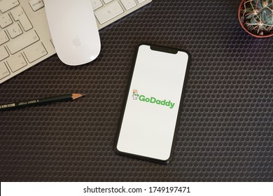 Barcelona, Spain - June 04, 2020; Go Daddy Apps with Keyboard Mouse and Succulent. GoDaddy is an Internet domain registrar and web hosting company. #GoDaddy