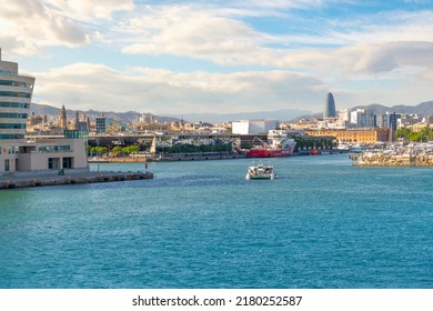 Barcelona, Spain - June 1 2022: View From The Mediterranean Sea Of The Port Of Barcelona And City Skyline Including The Torre Glòries Skyscraper.