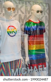 BARCELONA, SPAIN - JUNE 10, 2019: Michael Kors Store Ready For The Annual Gay Pride Parade. Rainbow Clothes Decorated Mannequins In Shop Window Display.