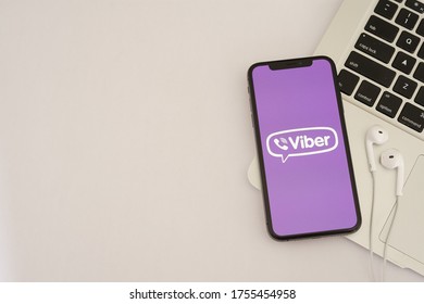 Barcelona, Spain - June 13, 2020; Viber App With Macbook And Earphone. Viber Is A Cross-platform VoIP And IM App. #Viber