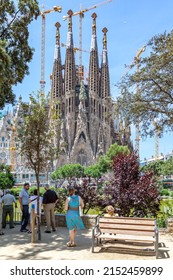 Barcelona, Spain - June 14, 2011: People In The Park By The La Sagrada Familia Cathedral In Barcelona