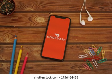 Barcelona, Spain - June 14, 2020; Door Dash Iphone Screen With Colored Pencils And Colored Paperclips. DoorDash Is A On-demand Prepared Food Delivery Service. #DoorDash