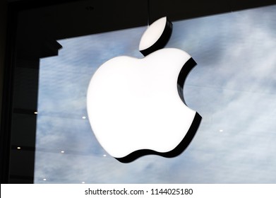 Barcelona, Spain - June 7, 2018: Logo of Apple Inc. on a Apple store. Apple is the multinational technology company headquartered in Cupertino, California and sells consumer electronics products.