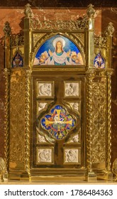 BARCELONA, SPAIN - MARCH 3, 2020: The Modern Enameled Lamb Of God And Virgin Mary On The Tabernacle In The Church Parroquia De La Mare De Deu De Nuria.