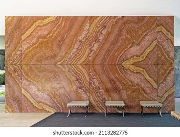 Barcelona, Spain, May. 2018: Interior of the Barcelona Pavilion feature granite wall and Barcelona chairs