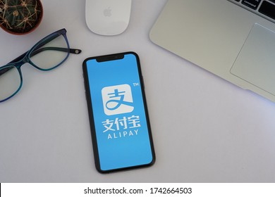 Barcelona, Spain - May 27, 2020; Alipay Iphone Screen on a White Background. Alipay is a third-party mobile and online payment platform. 