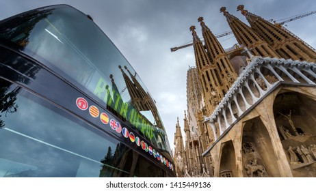 BARCELONA, SPAIN - NOVEMBER 09, 2018 - La Sagrada Familia Church Reflecting In The Tourist Double Decker Bus Front Window