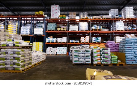 BARCELONA, SPAIN - NOVEMBER 14, 2019: Pallets Of Gardening Supplies In Plastic Bags In Agro Shop