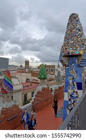 Barcelona, Spain - October 23.2019:The Mosaic Chimneys Made Of Broken Ceramic Tiles On Roof Of Palau Güell , One Of The Earlest Gaudi's Masterpieces.