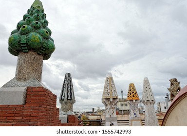 Barcelona, Spain - October 23.2019:The Mosaic Chimneys Made Of Broken Ceramic Tiles On Roof Of Palau Güell , One Of The Earlest Gaudi's Masterpieces.