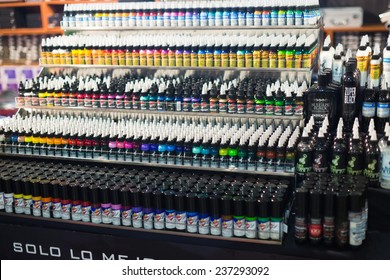 BARCELONA, SPAIN - OCTOBER 3, 2014: Many tubes of professional tattoo paint. The 17th edition of The Barcelona Tattoo Expo
