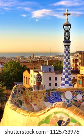 Barcelona, Spain: Park Guell. View of the city from Park Guell in Barcelona sunrise. Park Guell by architect Antoni Gaudi 