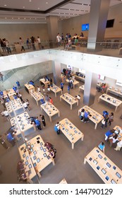 BARCELONA, SPAIN - SEPTEMBER 25: Shoppers Inside The Apple Store On September 25, 2012 In Barcelona, Spain. Apple Is The World's Most Valuable Company By Market Capitalisation.