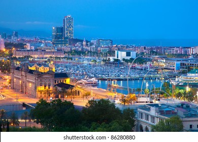 Barcelona, Spain Skyline At Night. Horbor View