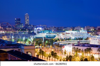 Barcelona, Spain Skyline At Night. Horbor View