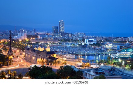 Barcelona, Spain Skyline At Night. Horbor View