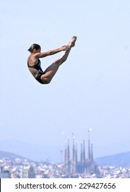 BARCELONA, SPAIN-JULY 12, 2003: female diver on the platform with the Gaudi cathedral in the background, during the final of the Swimming World Championship, in Barcelona.
